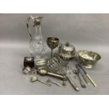 A quantity of silver plated ware including claret jug, toast rack, muffin dish and cover, pickle and