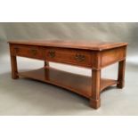 A reproduction burr walnut veneered coffee table in George III style, the rectangular top strung and