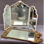 A white painted triptych dressing table mirror together with a gold painted wall mirror in William