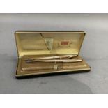 A Cross 14ct rolled gold pen and propelling pencil set in original box