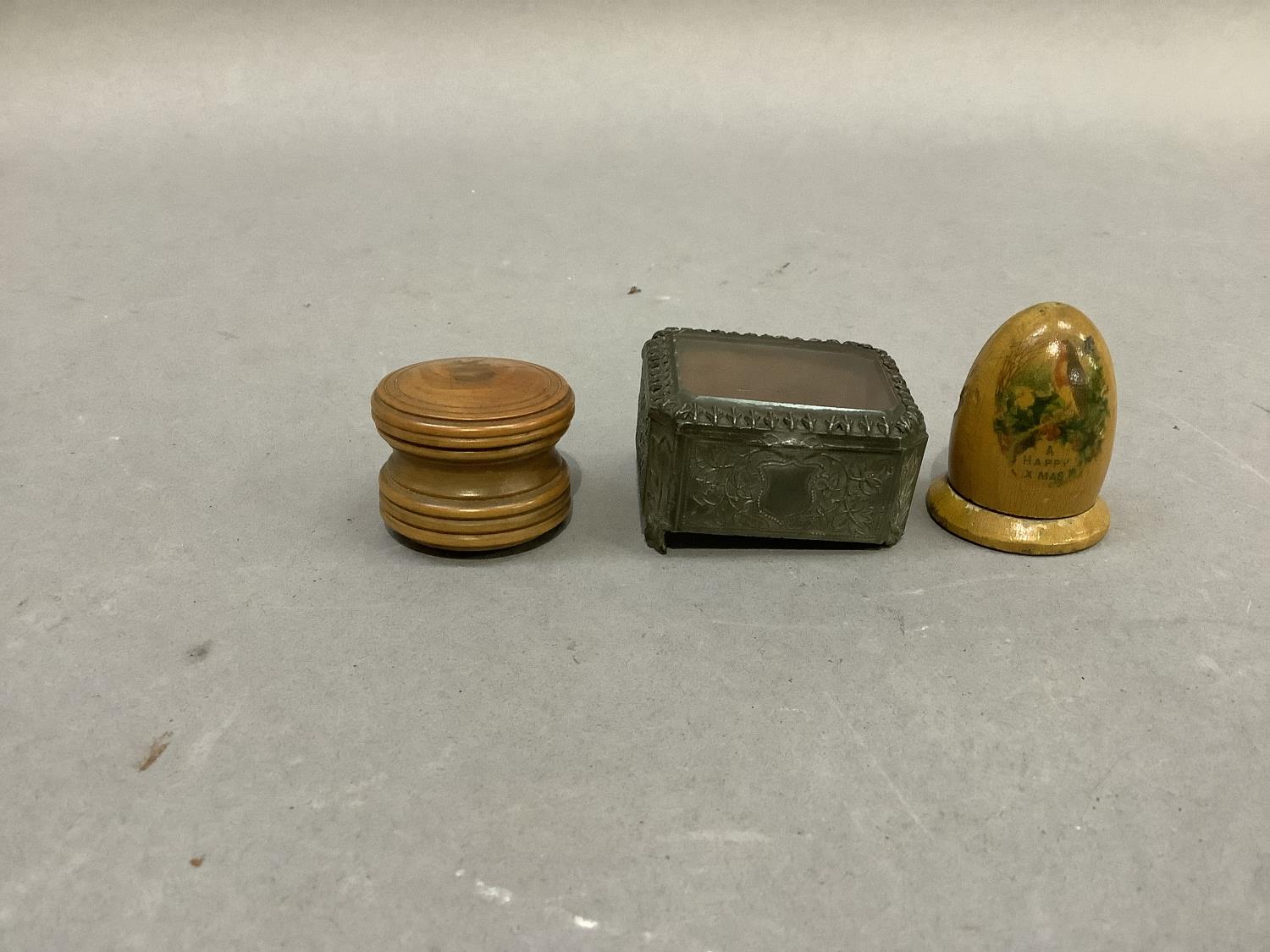 A 19th century turned fruit wood circular box with screw on lid, a treen thimble holder transfer - Image 4 of 5