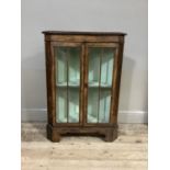 A reproduction burr walnut veneered dwarf standing corner cupboard in George I style the figured top