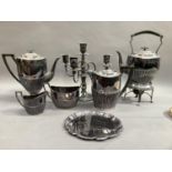 A five piece silver plated tea and coffee service comprising tea kettle on stand, coffee pot, hot