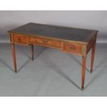 A BRASS MOUNTED MAHOGANY DESK IN LOUIS XV STYLE, the rectangular top inset with a black tooled