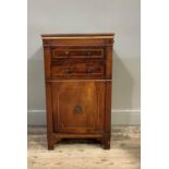 A George III mahogany night cupboard, the hinged top inlaid to the centre with a neo-classic urn