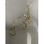 A neck chain in 9ct gold facetted curb links, approximate length 55cm, approximate weight 11g