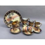 A Camel China, Japan part porcelain coffee service decorated with dessert scenes within gilt and