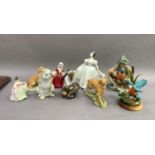 A Royal Doulton figure, 'Lavinia', another, 'Kate', a Royal DOulton miniature figure, 'Sarah',