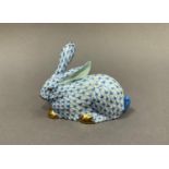 A Herend porcelain rabbit in blue, white and gilt 9cm high