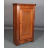 A late 19th century American stained pine and Oregon pine cupboard, flared top above a pair of short