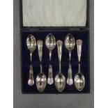 A George V set of six shell and thread pattern silver teaspoons, by J T & CO, Sheffield 1927, cased