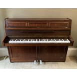 A Zimmermann oak cased upright cottage piano, overstrung over damper, with iron frame