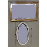 A gilt rectangular wall mirror together with a cream oval wall mirror, 60cm x 92cm and 43.5cm by
