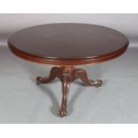 A VICTORIAN MAHOGANY TILT TOP BREAKFAST TABLE, circular, on a turned column and three moulded