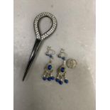 A pair of mid 20th century ear pendants in white base metal, set with simulated pearls, blue paste