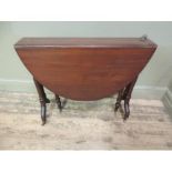 A Victorian mahogany Sutherland table with pair of D-shaped folding leaves on turned, tapered