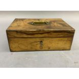 A Victorian figured walnut jewel box having a brass recessed handle to the cover, the interior lined