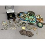 A collection of silver and silver gilt jewellery including rings, earrings, brooches, pendants and a