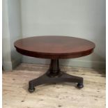 A William IV plum pudding mahogany circular centre table on turned tapered column, plain sockel,