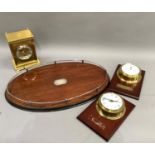 A reproduction mahogany oval tray with post and rail border bearing presentation inscription to