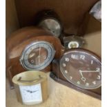 A quantity of mantel clocks, veneered and gilt metal