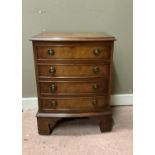 A reproduction small mahogany bow fronted chest of drawers, cock beaded, on bracket feet, 46cm wide,