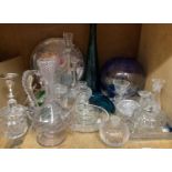 A quantity of decorative glassware including vases, decanters, table bell, dressing table trays,