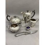 A quantity of silver plated ware to include four piece tea service, cut glass and silver plated