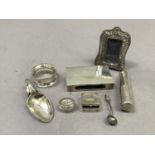 A small quantity of miscellaneous silver items including cheroot holder with hinged bun cover, a