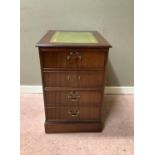 A reproduction mahogany filing cabinet, matching the preceding lot, fitted two short drawers as
