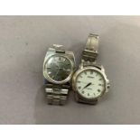 A Seiko gentleman's kinetic date wristwatch in stainless steel case No 970028, sunburst silvered