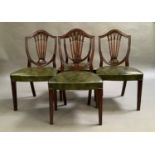 A set of four reproduction mahogany Hepplewhite style camel back dining chairs with pierced