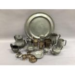 A quantity of Britannia and pewter ware including charger, patterns, tankards including one from the