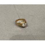 A gentleman's single stone cubic zirconia ring in 9ct gold claw set with a brilliant cut stone,