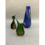 A Murano green and amber glass cat, 18.5cm high, a Murano green and amber glass jug, 17cm and a