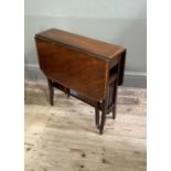 An Edward VII satinwood, boxwood and ebony inlaid Sutherland table, 60cm wide