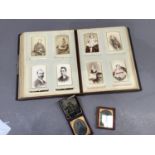 A Victorian calf bound photograph album with quantity of inset black and white photographs