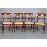 A SET OF FOUR VICTORIAN MAHOGANY DINING CHAIRS, broad top rail, plain tie rail, upholstered drop