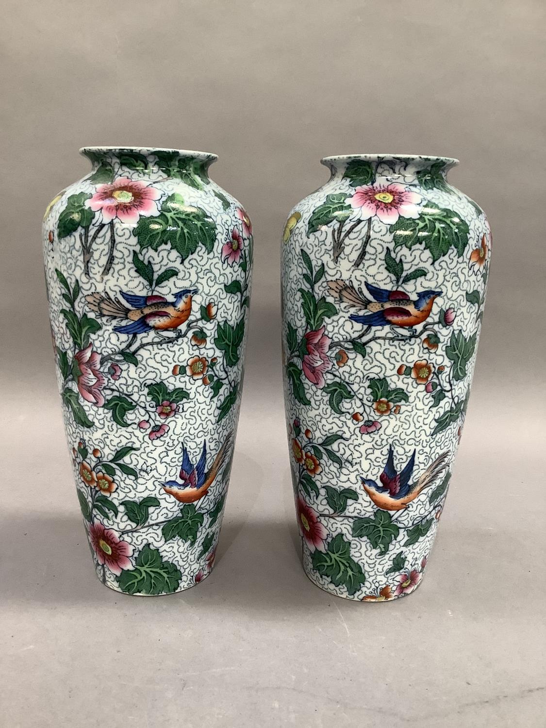 A pair of Losol ware vases of tapered cylindrical form, printed and enamelled with scattered - Image 2 of 4