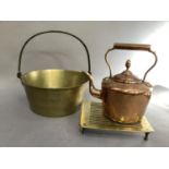 A Victorian/Edwardian copper kettle 28cm high, a brass preserve pan with iron hoop handle, 31cm