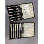 A cased set of six silver cake forks, Sheffield 1936, together with a set of six silver handled