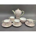 A Shelley Lyric pattern coffee pot, sugar and cream, three cups and four saucers (one cup cracked)