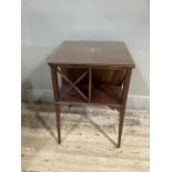 An Edwardian inlaid mahogany book table, the square top satinwood boxwood and ebony strung inlaid to