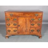 A GEORGE III MAHOGANY SIDEBOARD, the rectangular top above one long drawer, central cupboard flanked