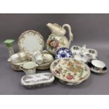 An Edward VII china tea service of floral and butterfly border comprising six cups, nine saucers,
