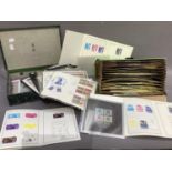 A quantity of stamps to include a box of nine various albums, box file GWFDC, a bag various, tube