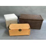 A wicker trunk with another and a wicker stool with square upholstered top, largest trunk 93cm