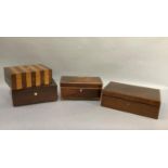 A 19th century mahogany tea caddy with boxwood stringing, on gilt metal ball feet, together with a