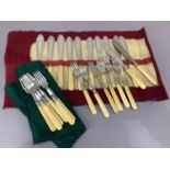 A set of twelve EPNS and ivory handled fish knives and forks