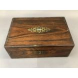 A Victorian rosewood veneered box, the hinged cover and front inlaid in cut brass work and mother-